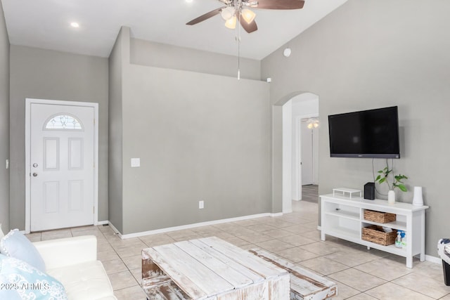 tiled foyer with ceiling fan