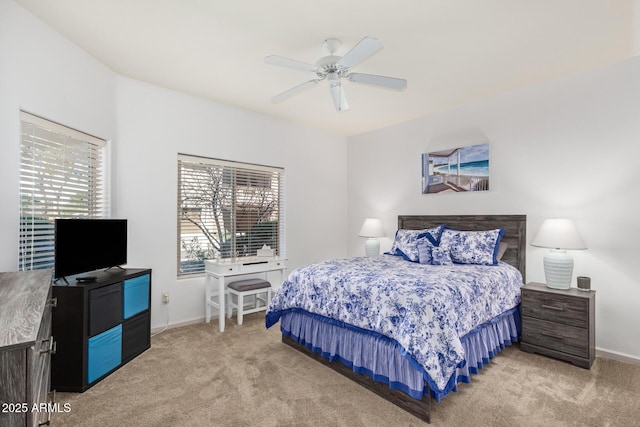 14000 N 94th St N Unit 1129, Scottsdale, AZ 85260 - bedroom with light carpet and ceiling fan
