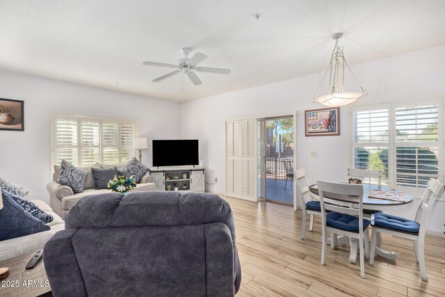 14000 N 94th St N Unit 1129, Scottsdale, AZ 85260 - living area featuring light wood-style flooring and ceiling fan