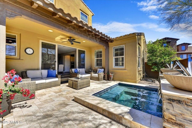 exterior space featuring outdoor lounge area, a ceiling fan, and an in ground hot tub
