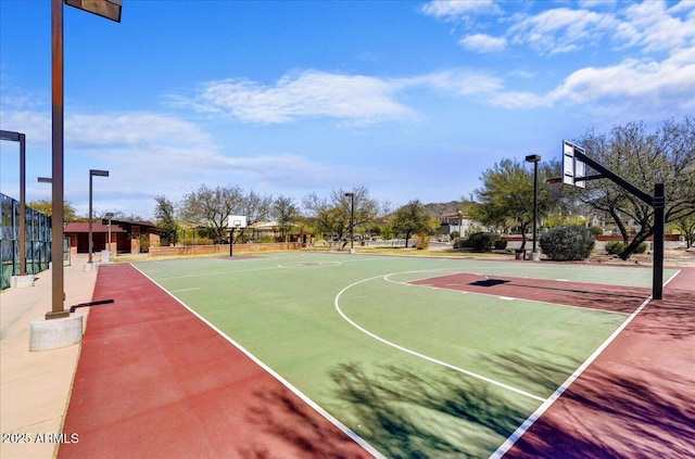 view of sport court with fence and community basketball court