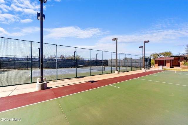 view of sport court featuring community basketball court and fence