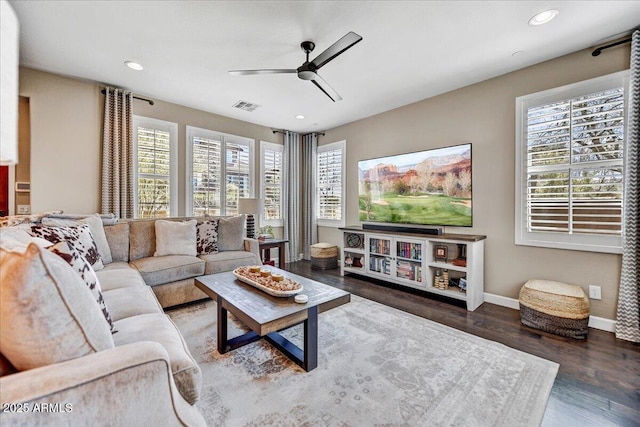 living room featuring recessed lighting, baseboards, visible vents, a ceiling fan, and wood finished floors