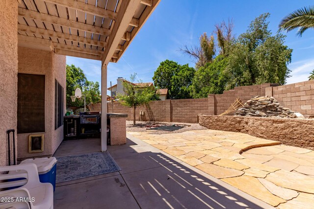 view of patio with a fenced backyard