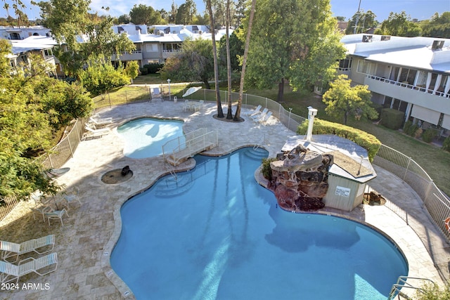 view of pool featuring a patio area