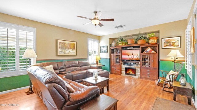 bedroom with dark hardwood / wood-style flooring and ceiling fan