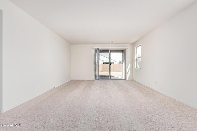spare room featuring carpet flooring