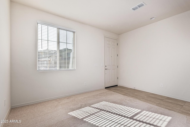 view of carpeted spare room