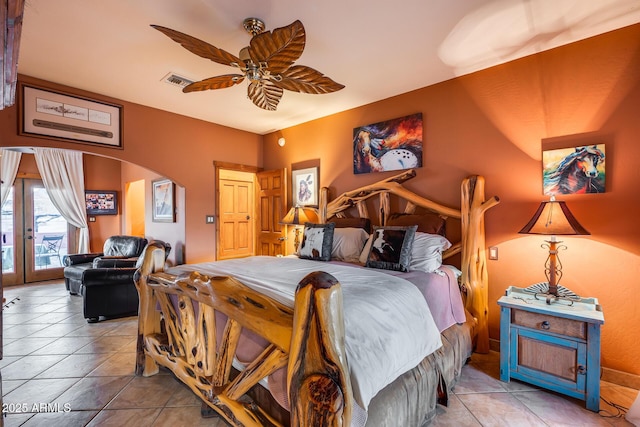 tiled bedroom featuring access to exterior and ceiling fan