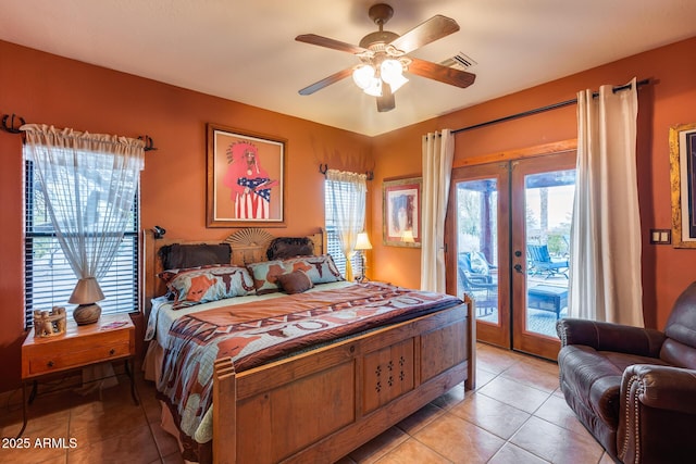 tiled bedroom with french doors, ceiling fan, and access to outside