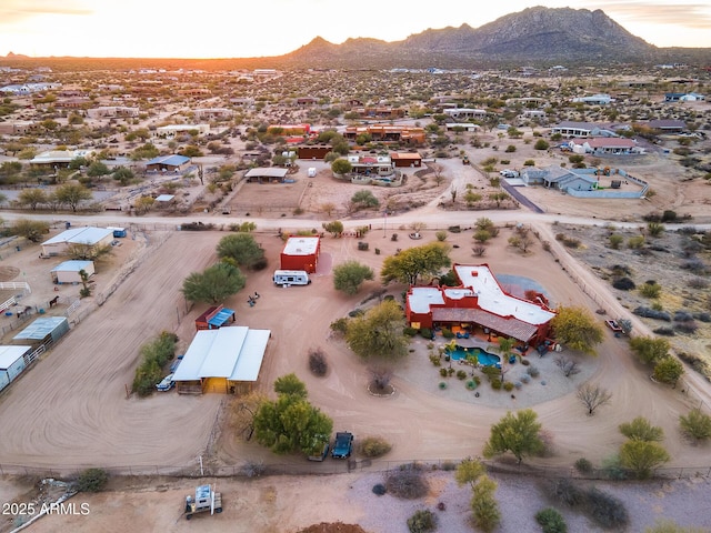 aerial view at dusk with a mountain view