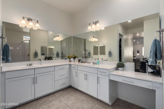 bathroom with tile patterned flooring and vanity