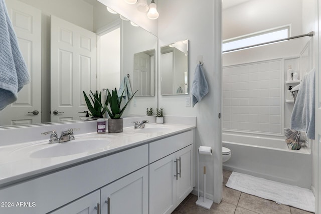 full bathroom with tile patterned flooring, vanity, shower / bathtub combination, and toilet