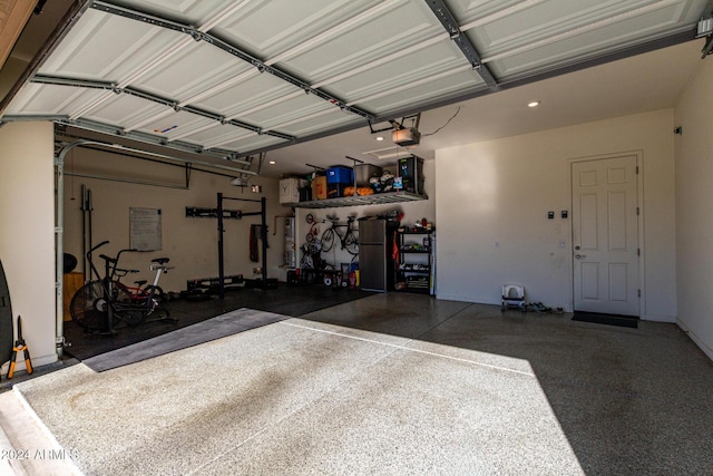 garage featuring a garage door opener