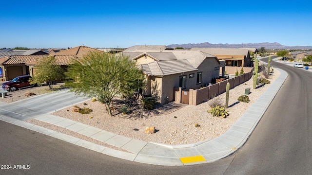 view of front of home with a mountain view