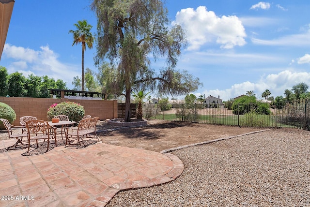 706 N El Dorado Dr, Gilbert, AZ 85233 - fenced backyard featuring a patio area and outdoor dining space