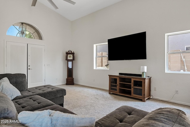 706 N El Dorado Dr, Gilbert, AZ 85233 - living room featuring carpet floors, high vaulted ceiling, ceiling fan, plenty of natural light, and baseboards