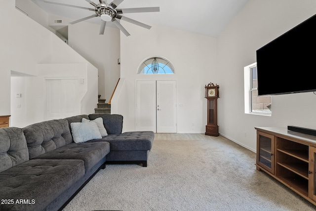 706 N El Dorado Dr, Gilbert, AZ 85233 - carpeted living area with high vaulted ceiling, a ceiling fan, stairway, and baseboards
