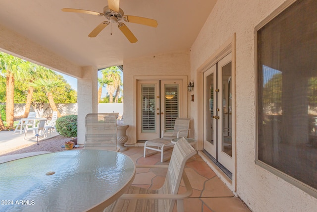 view of patio with ceiling fan and french doors