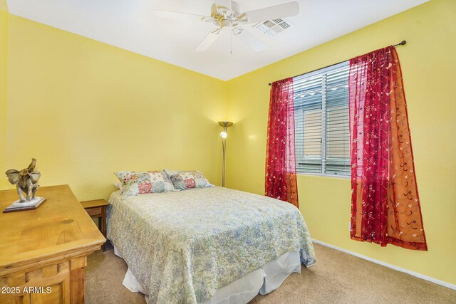 17012 S 27th Ln, Phoenix, AZ 85045 - carpeted bedroom featuring visible vents, multiple windows, baseboards, and ceiling fan