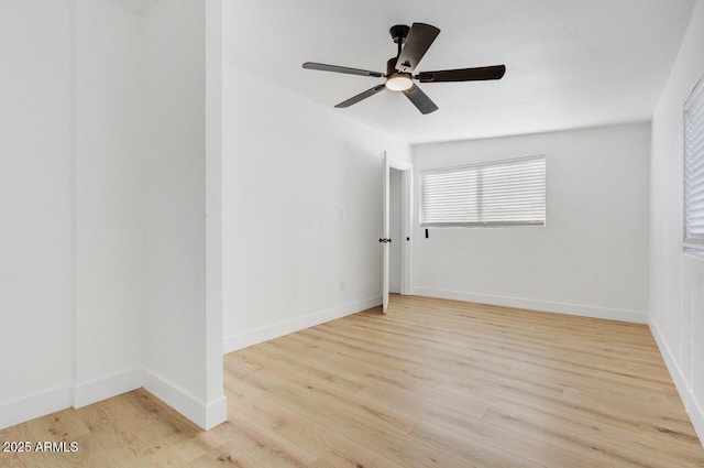 unfurnished room with light hardwood / wood-style flooring and ceiling fan