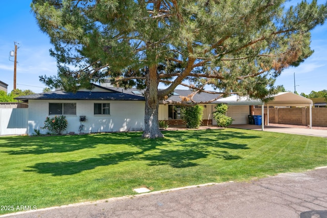 8135 N 5th St, Phoenix, AZ 85020 - ranch-style house with concrete driveway and a carport