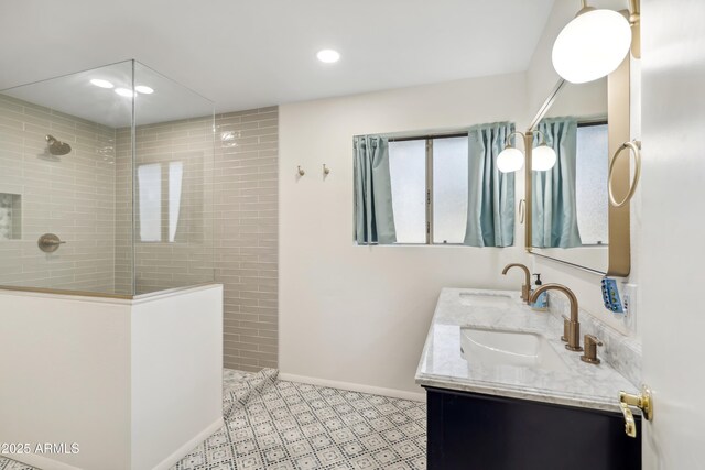 8135 N 5th St, Phoenix, AZ 85020 - bathroom featuring recessed lighting, a walk in shower, double vanity, and baseboards