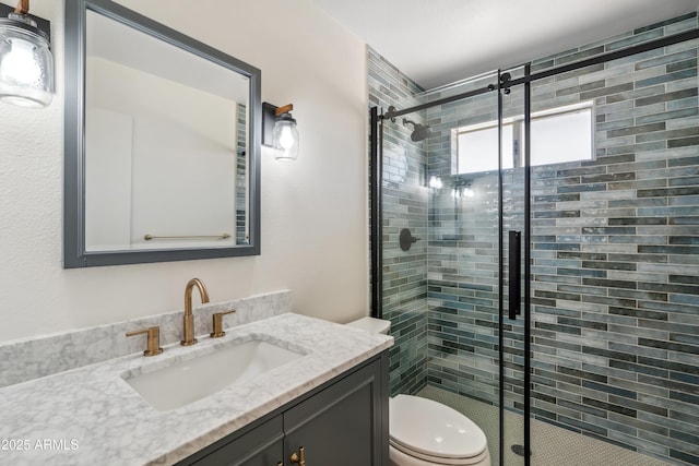 8135 N 5th St, Phoenix, AZ 85020 - bathroom featuring a stall shower, toilet, and vanity