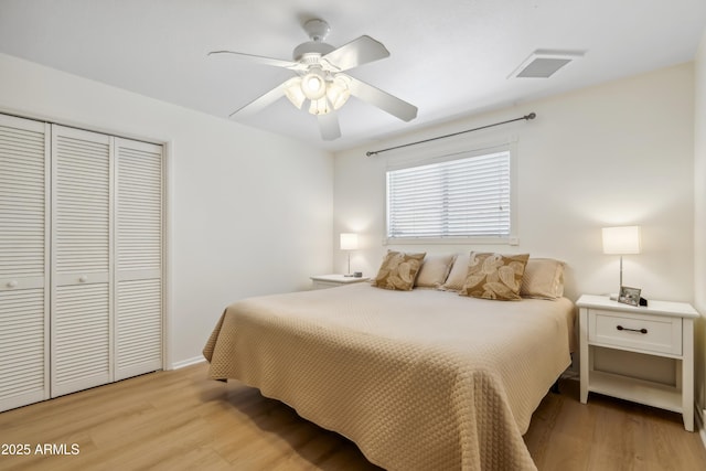 8135 N 5th St, Phoenix, AZ 85020 - bedroom featuring a closet, light wood-style floors, and ceiling fan