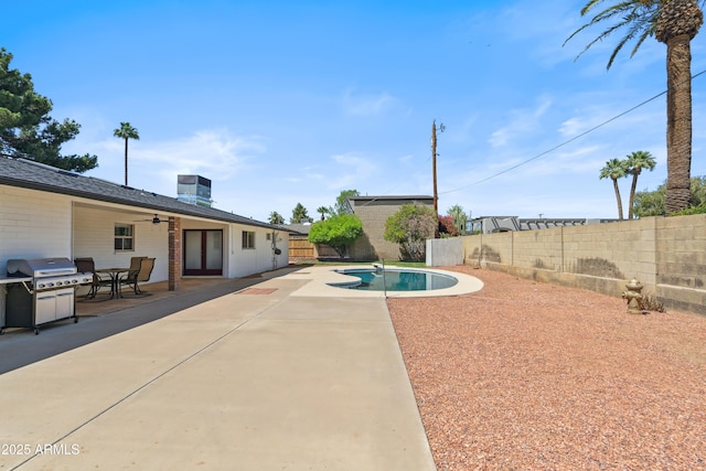 8135 N 5th St, Phoenix, AZ 85020 - view of swimming pool with a fenced backyard, ceiling fan, a grill, and a patio