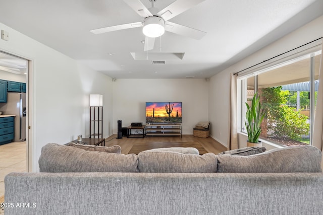 8135 N 5th St, Phoenix, AZ 85020 - living area with ceiling fan, a skylight, and baseboards