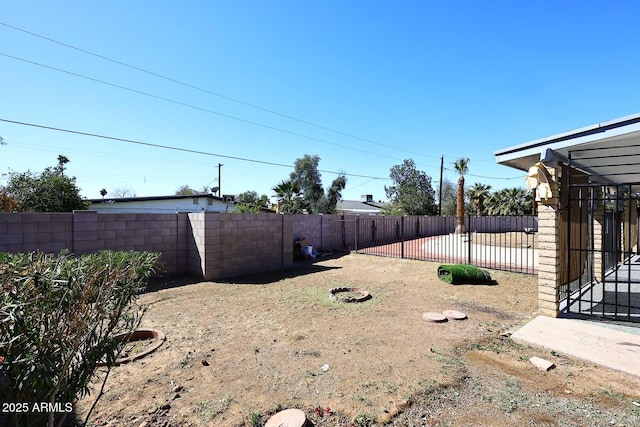 view of yard featuring a fenced backyard