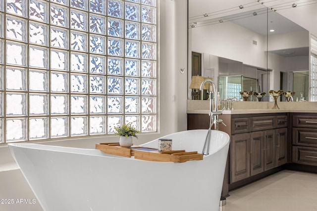 13621 E Aster Dr, Scottsdale, AZ 85259 - bathroom featuring a soaking tub, vanity, and visible vents