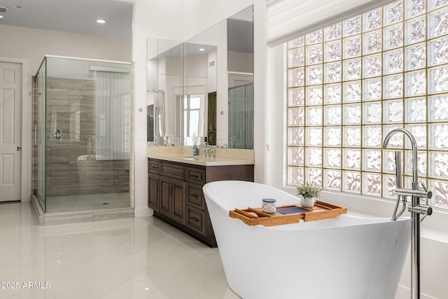 13621 E Aster Dr, Scottsdale, AZ 85259 - full bathroom with a wealth of natural light, a stall shower, and vanity