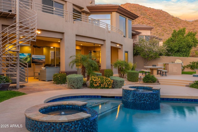 13621 E Aster Dr, Scottsdale, AZ 85259 - view of pool featuring a pool with connected hot tub, area for grilling, a mountain view, and a patio
