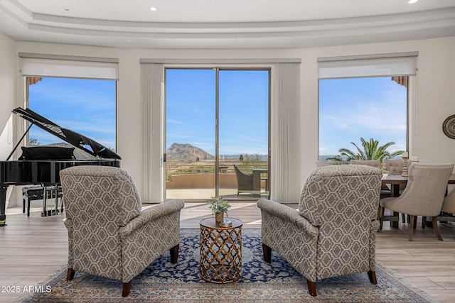 13621 E Aster Dr, Scottsdale, AZ 85259 - sitting room featuring a mountain view, wood finished floors, and recessed lighting