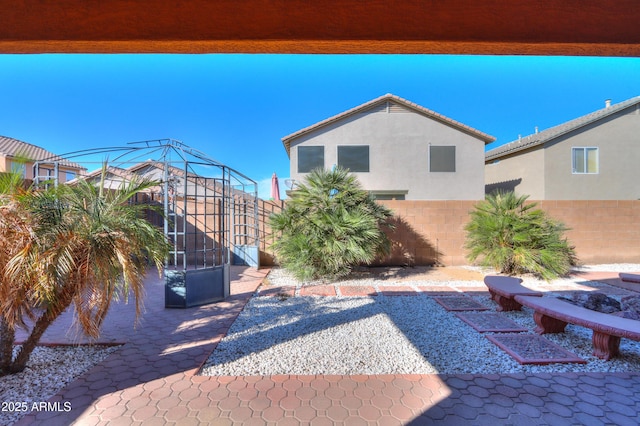 view of patio with fence