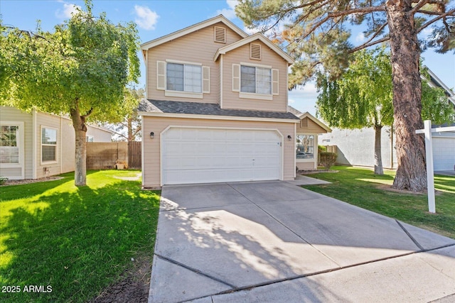 traditional-style house with an attached garage, fence, concrete driveway, roof with shingles, and a front lawn