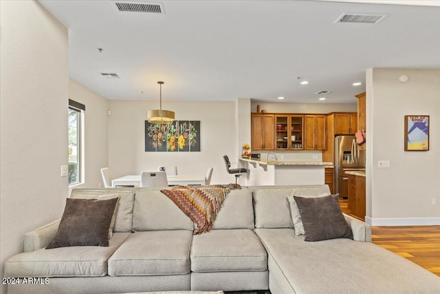 living room featuring light wood-type flooring