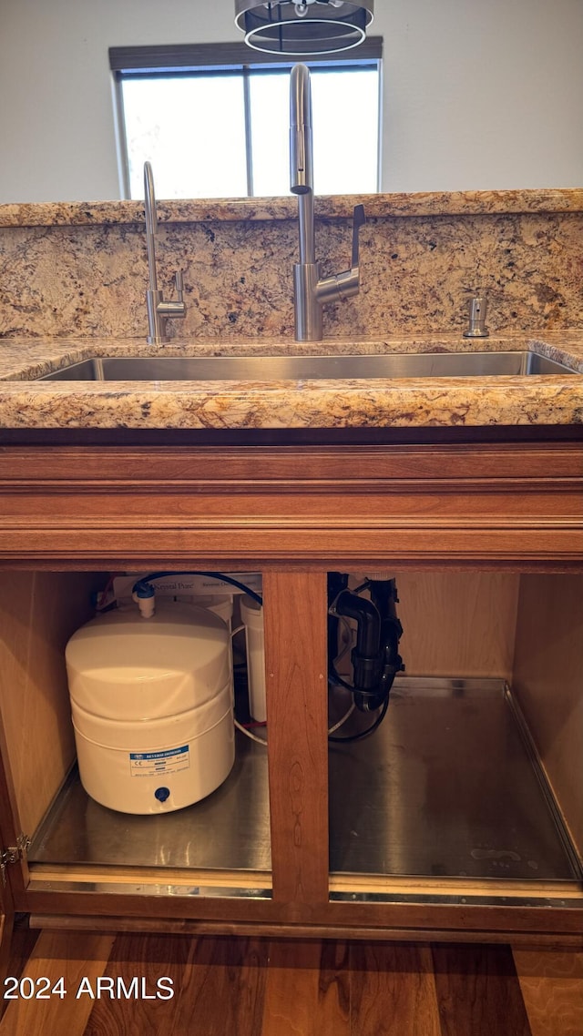 details with wood-type flooring and sink