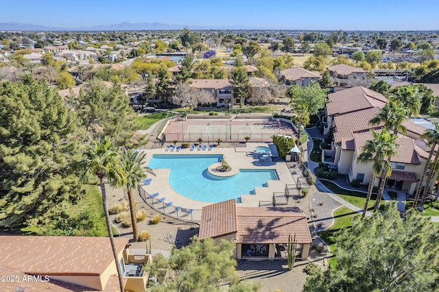 birds eye view of property featuring a mountain view