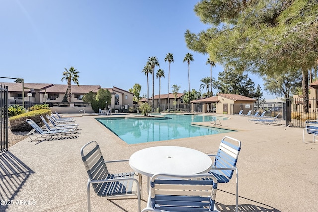 view of pool featuring a patio area