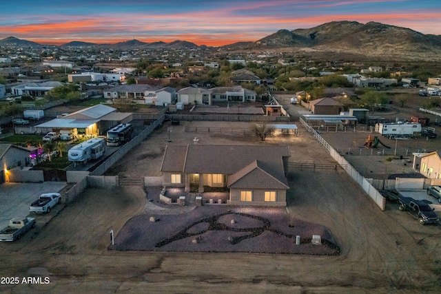 birds eye view of property featuring a mountain view and a residential view