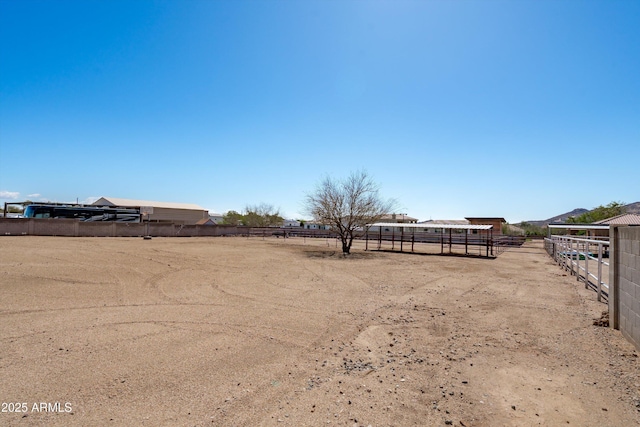 view of yard with an outbuilding and an enclosed area