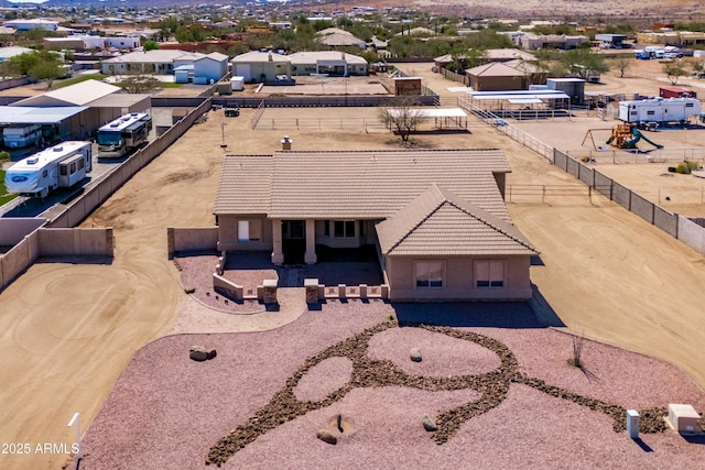 birds eye view of property with a residential view