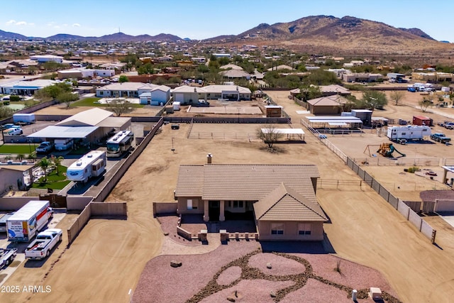 drone / aerial view featuring a mountain view