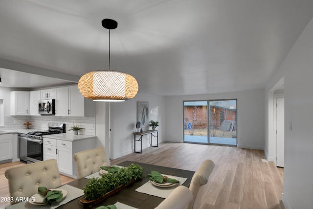 dining room featuring light hardwood / wood-style flooring