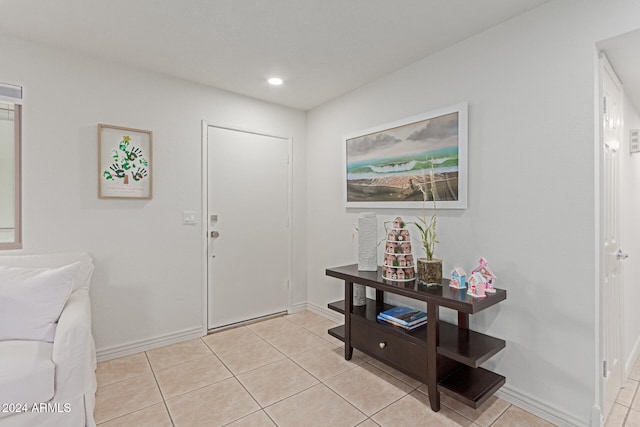 entrance foyer featuring light tile patterned flooring