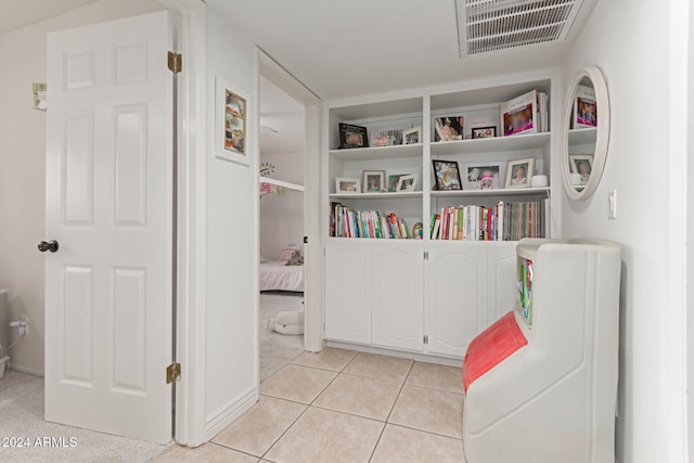 living area featuring light tile patterned floors