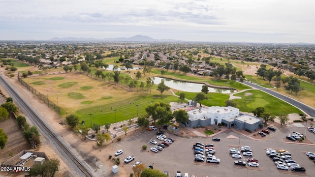 bird's eye view with a water and mountain view